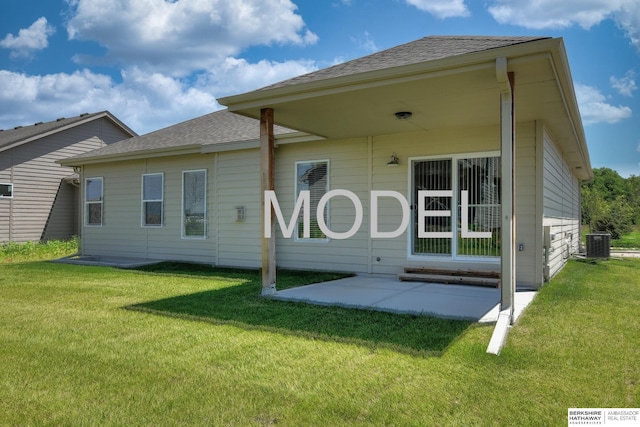 back of house with a yard, a patio, and central air condition unit