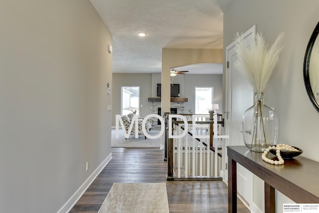 hallway featuring dark wood-type flooring