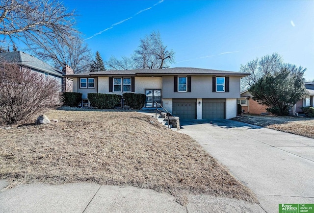 view of front of property featuring a garage