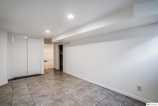 basement with light tile patterned floors