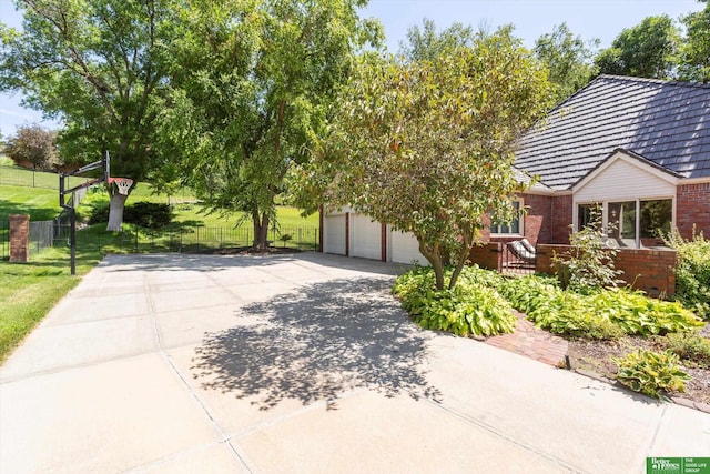 view of property exterior featuring a garage