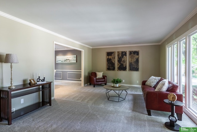 carpeted living room with ornamental molding