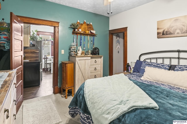 bedroom featuring a textured ceiling