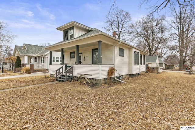 bungalow-style home featuring a porch