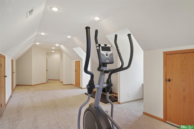 workout area with light colored carpet and lofted ceiling