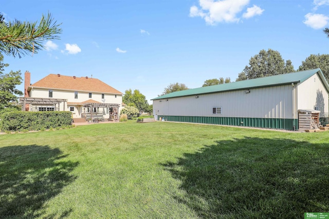 view of yard with a pergola