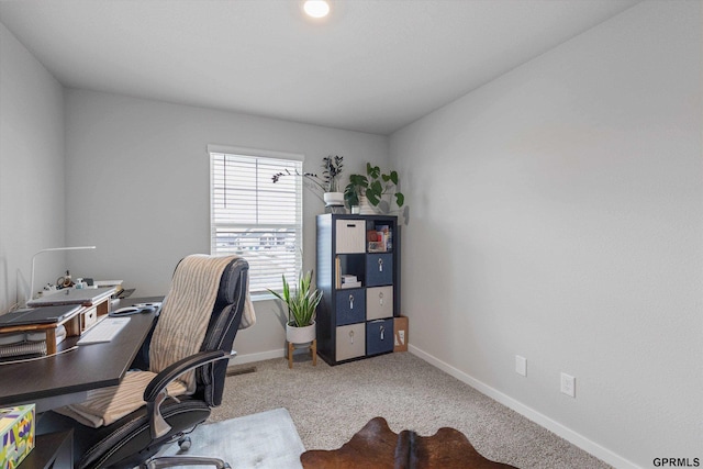 view of carpeted office space