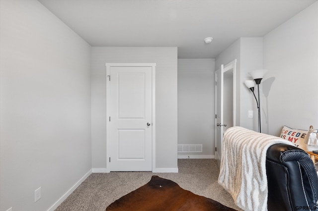 bedroom featuring carpet flooring