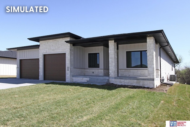 view of front of home with a garage, cooling unit, and a front lawn