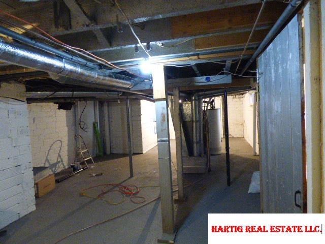 basement with gas water heater