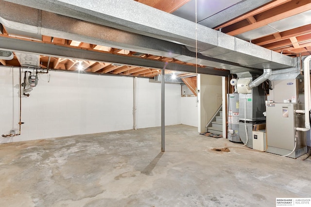 basement with heating unit and gas water heater