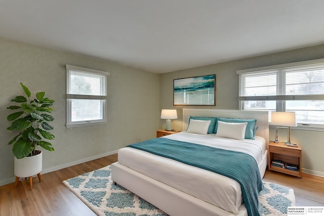 bedroom featuring light hardwood / wood-style floors