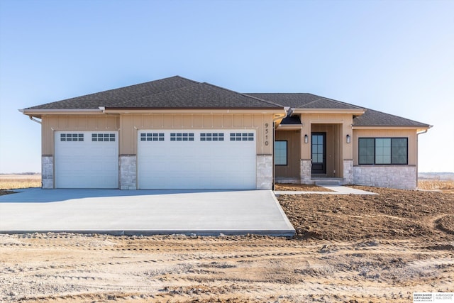 prairie-style home with a garage