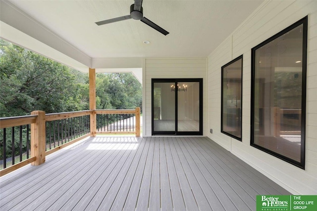 wooden terrace featuring ceiling fan