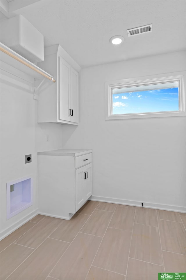 clothes washing area featuring electric dryer hookup