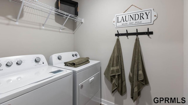 laundry area featuring separate washer and dryer