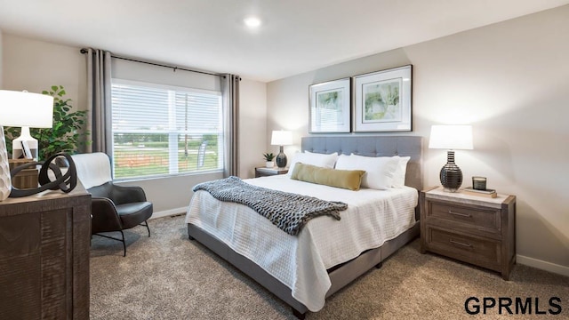 bedroom featuring light colored carpet