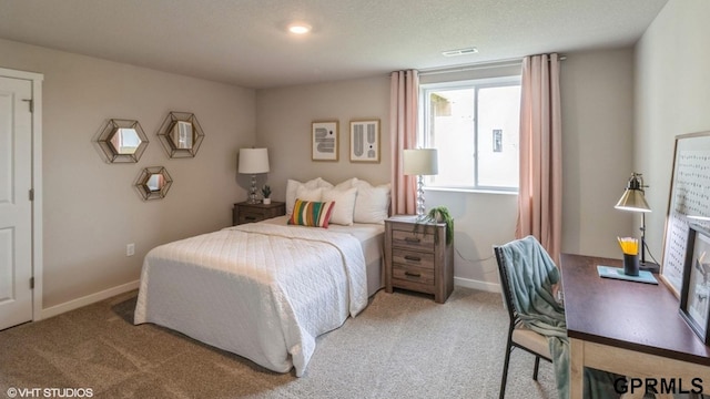 bedroom featuring carpet