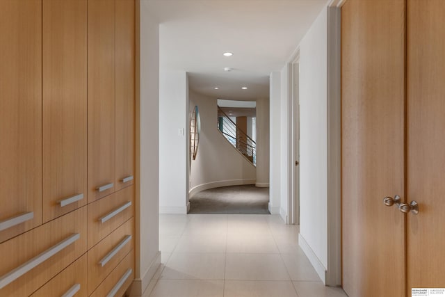 hallway with light tile patterned floors