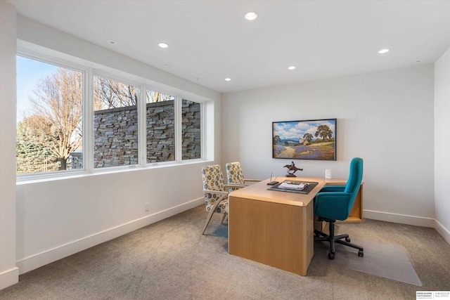 view of carpeted office space