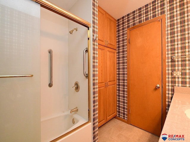 bathroom featuring vanity and bathing tub / shower combination