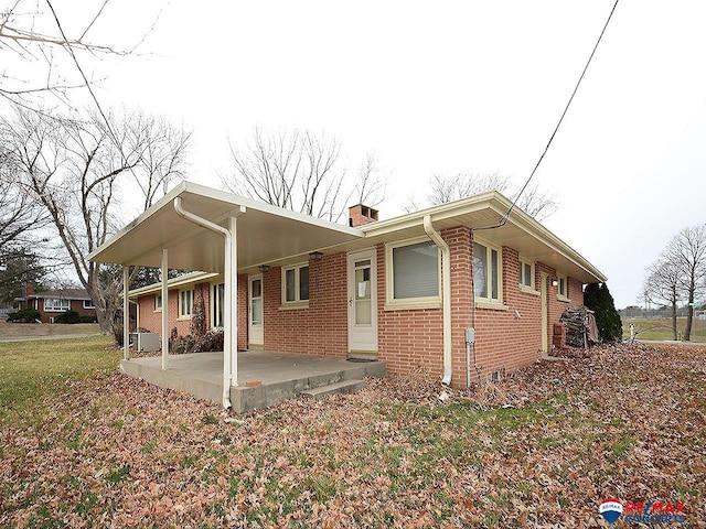 view of front facade with a patio area