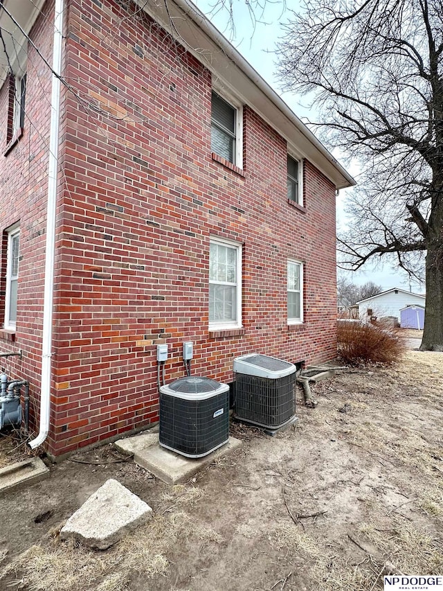 view of home's exterior featuring central AC