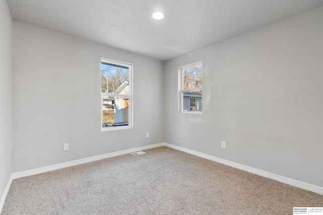 view of carpeted spare room