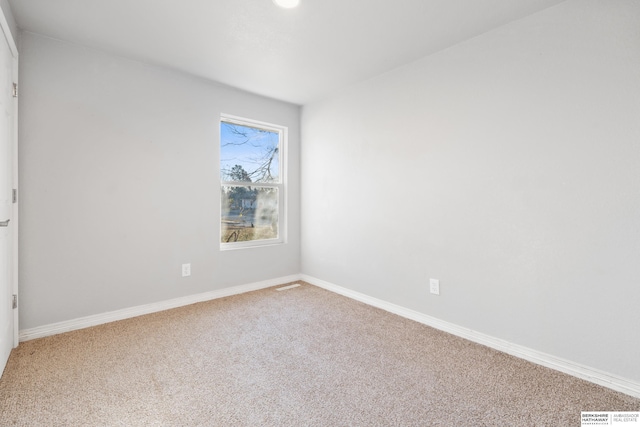 view of carpeted spare room