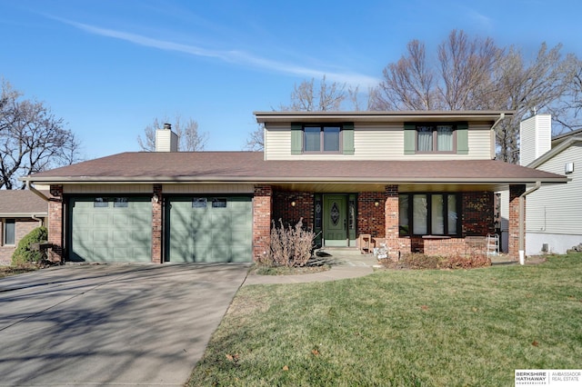 view of front property with a garage, covered porch, and a front lawn