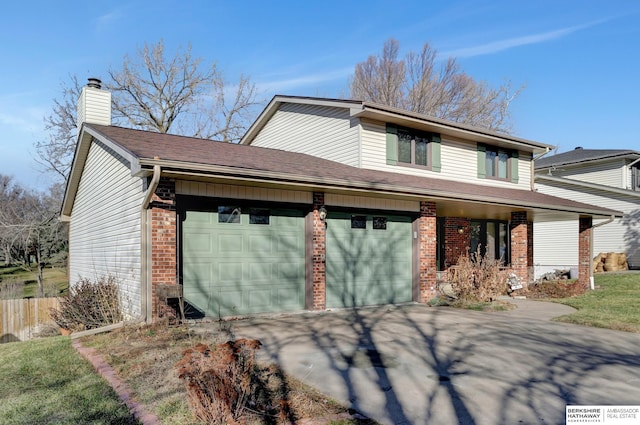 view of front of home with a garage