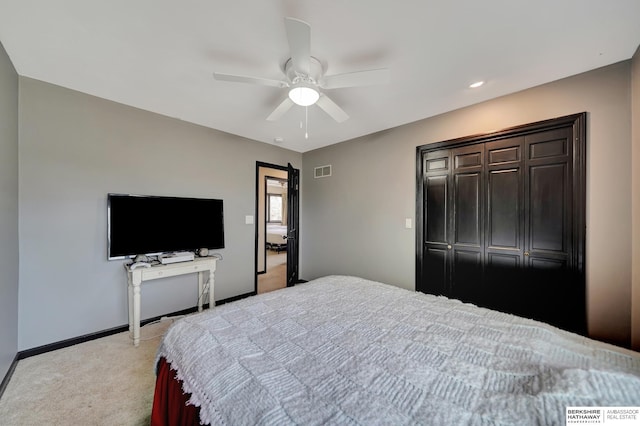 carpeted bedroom with ceiling fan