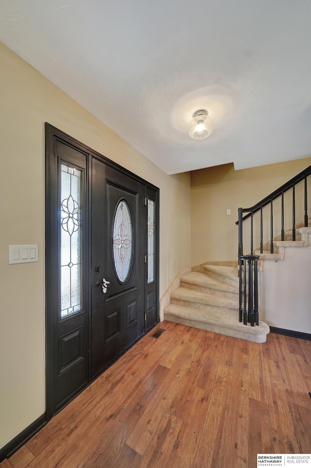 foyer with hardwood / wood-style floors