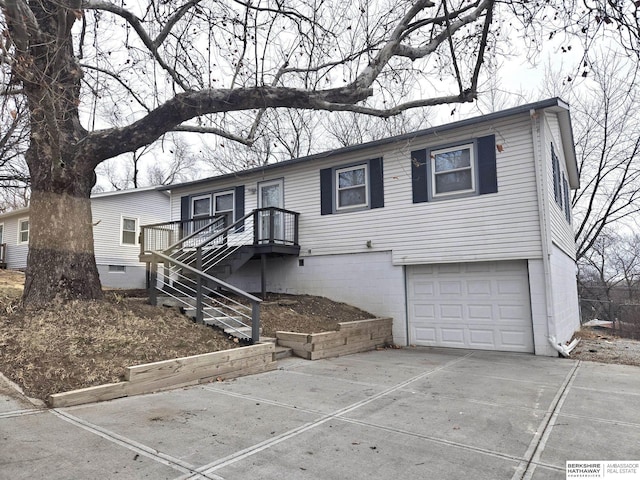 view of front of property with a garage