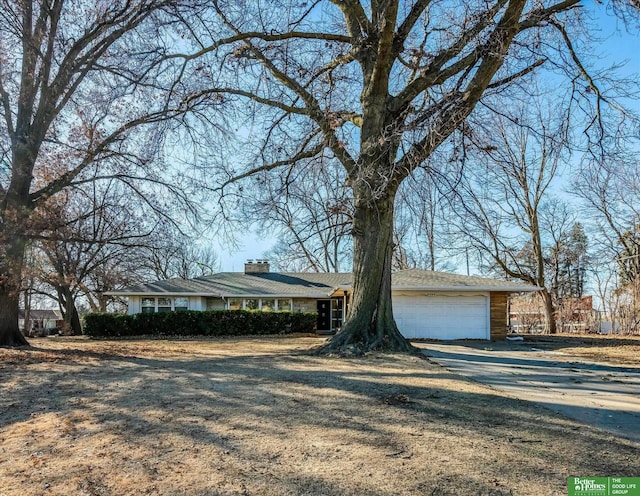 ranch-style house with a garage