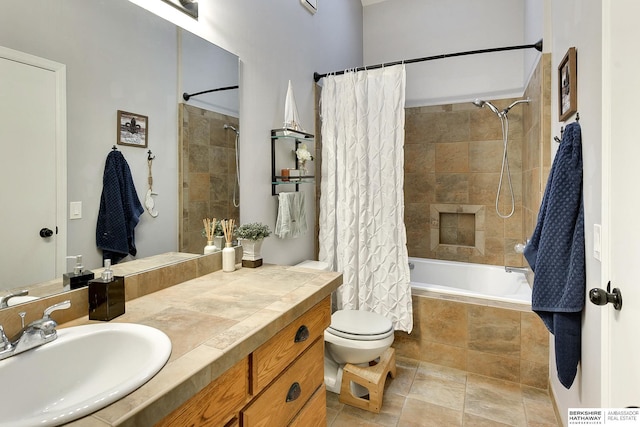 full bathroom with vanity, toilet, tile patterned floors, and shower / bath combo with shower curtain