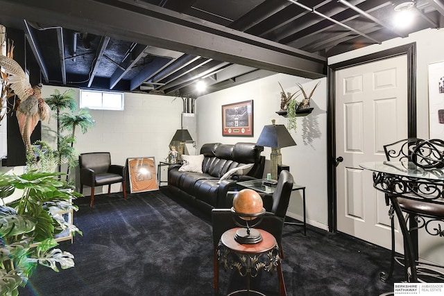 living room featuring dark colored carpet