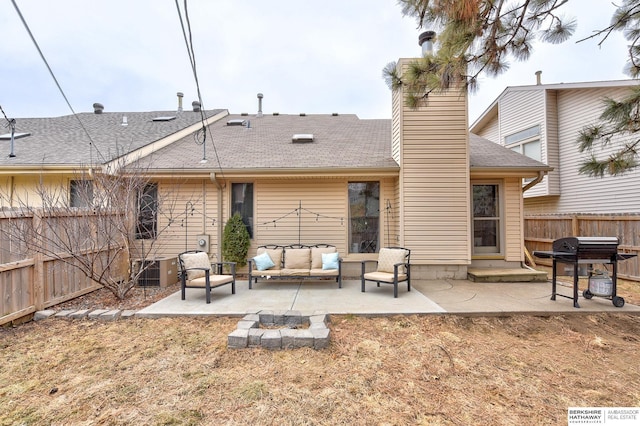 rear view of house featuring an outdoor hangout area and a patio