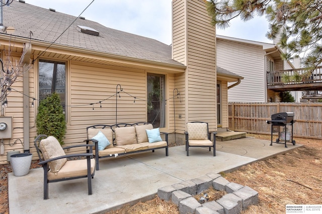 view of patio with a grill