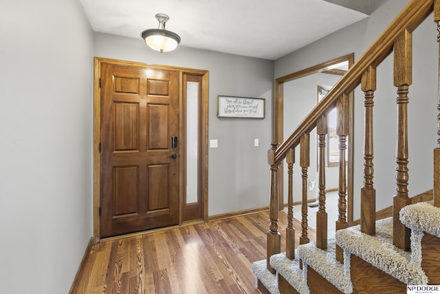 foyer featuring hardwood / wood-style flooring