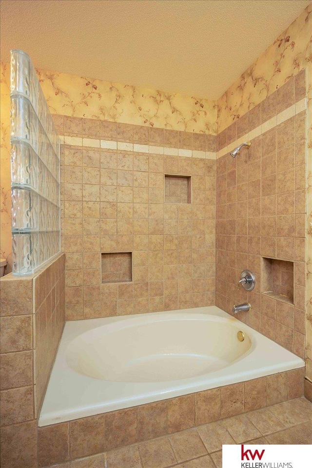 bathroom featuring a textured ceiling