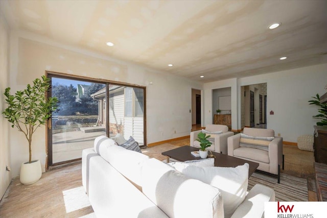 living room with light hardwood / wood-style floors