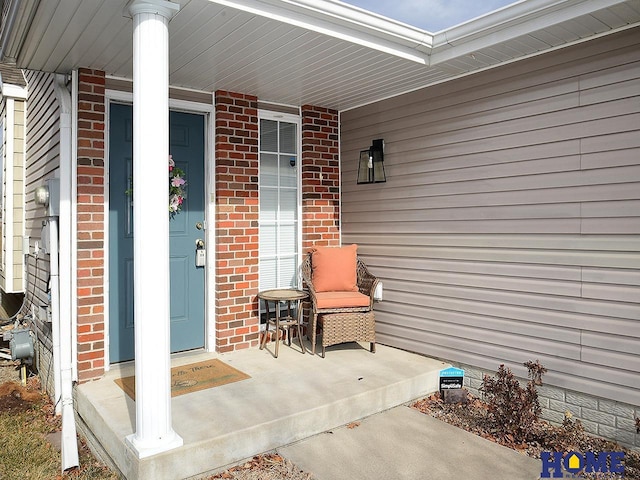 entrance to property with a porch