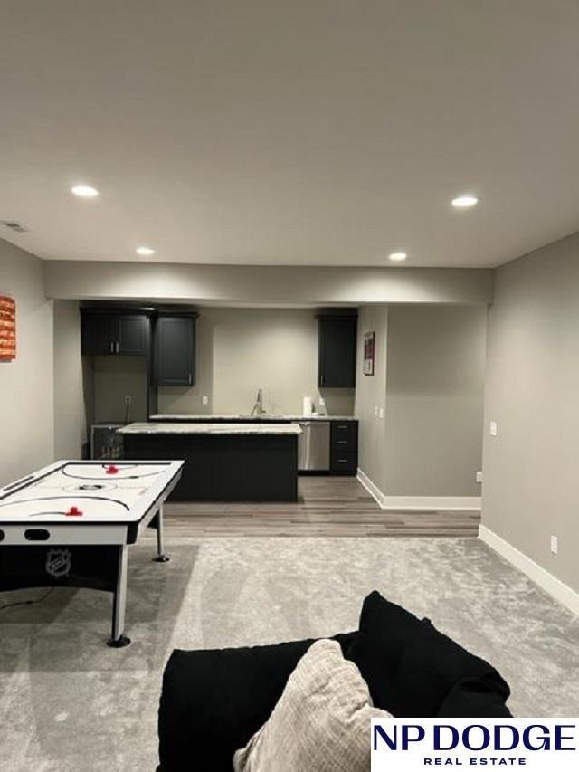 playroom featuring hardwood / wood-style floors