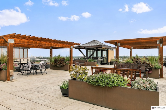 view of patio / terrace featuring a gazebo and a pergola