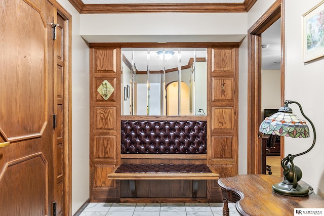 interior space with crown molding