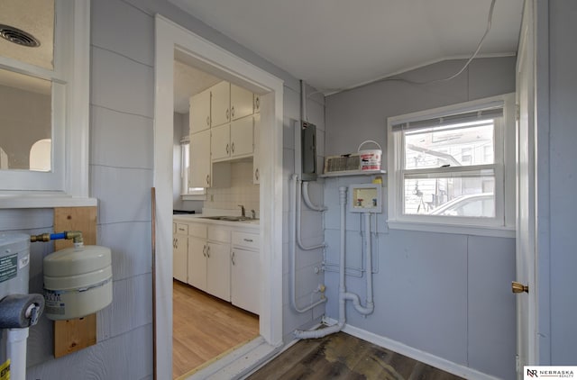 utility room featuring a sink and visible vents