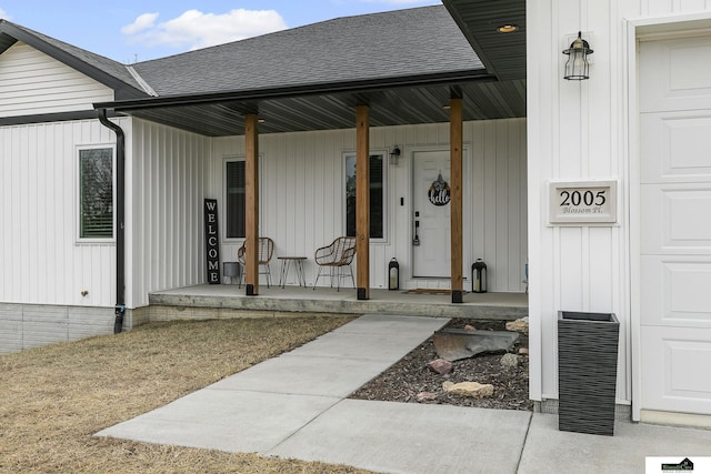 doorway to property with covered porch