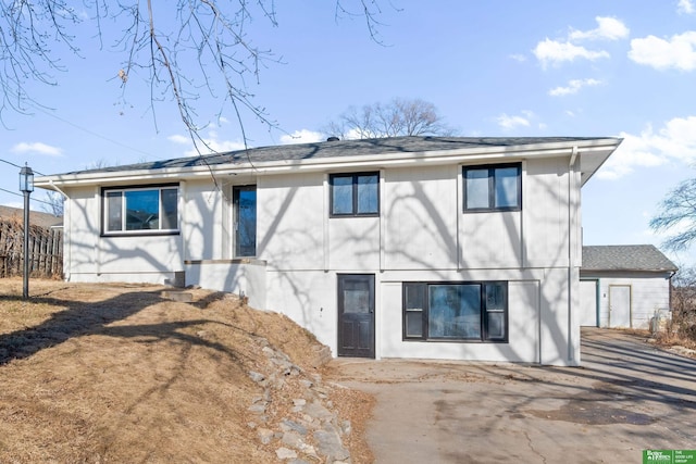 rear view of property with a patio area