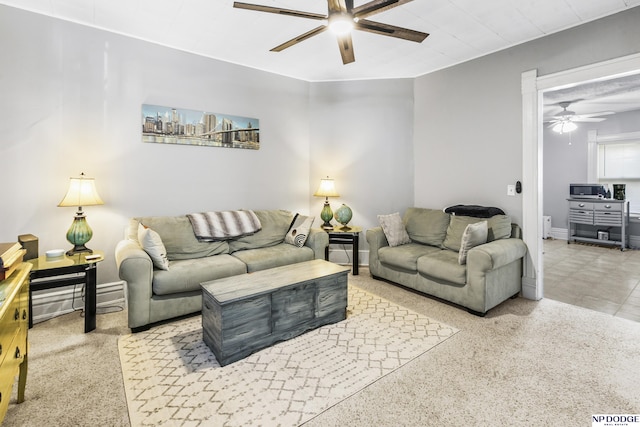 living room with ceiling fan